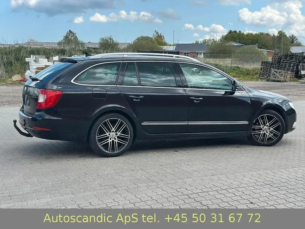 Używany Skoda Superb Elegance 170 KM (125 kW) 2010 Czarny Kombi