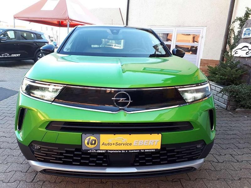 Gebraucht Opel Mokka Elegance 131 PS (96 kW) 2021 Matcha green (metallic) SUV