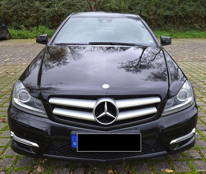 Schwarz Gebraucht 2012 Mercedes C180 Style Coupé | 10.800 € (Fairer Preis) - Bild 1/4