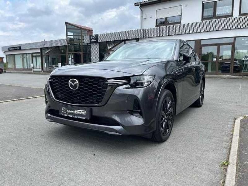 Machine grey (metallic) Gebraucht 2022 Mazda CX-60 SUV | 34.990 € (Fairer Preis) - Bild 1/4