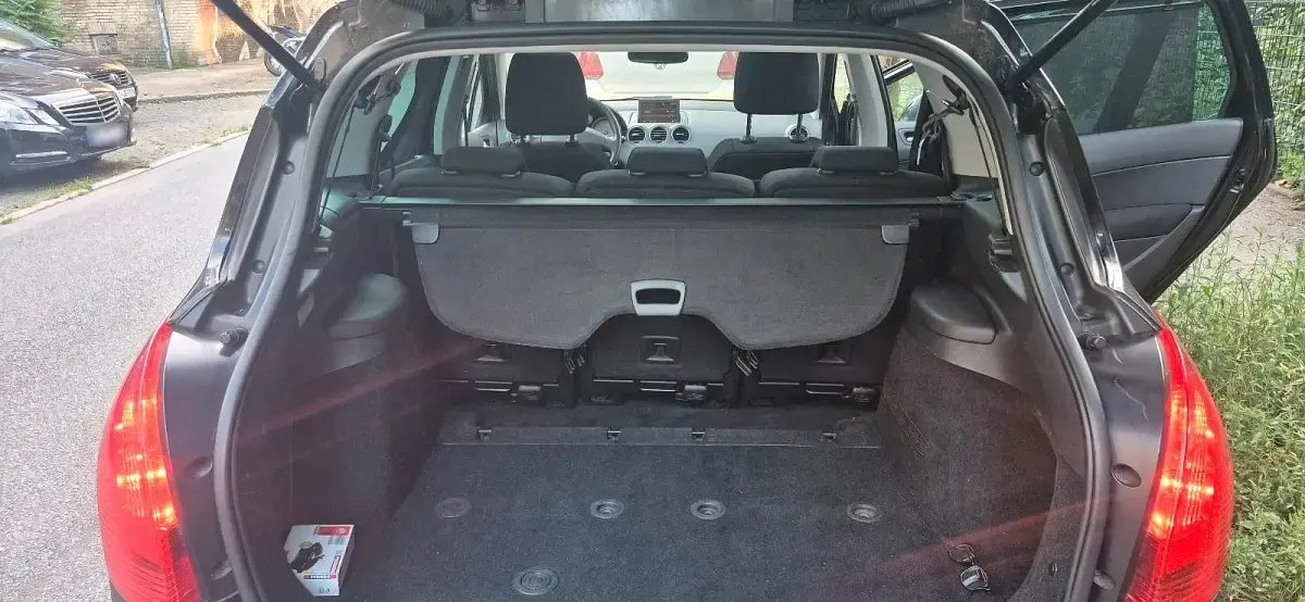 Gebraucht Peugeot 308 SW 109 PS (80 kW) 2012 Schwarz Kombi