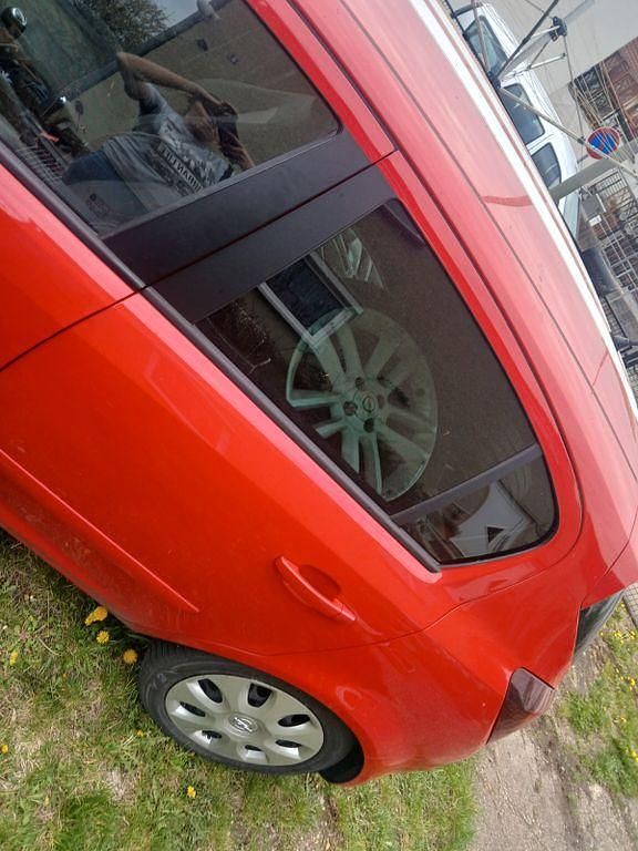 Second-hand Opel Corsa 87 CP (63 kW) 2011 Roșu Hatchback