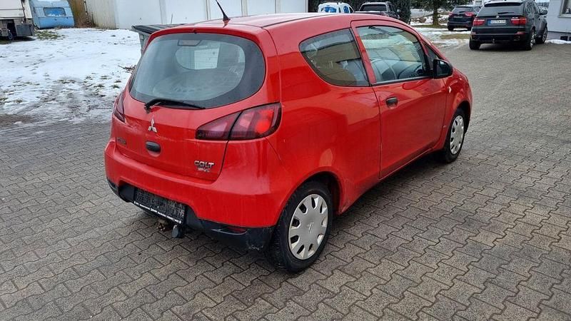 Gebraucht Mitsubishi Colt Basis 75 PS (55 kW) 2009 Rot Kleinwagen