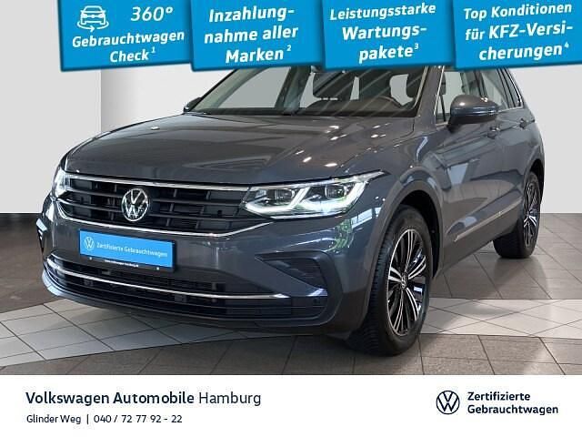 B0 delfingrau metallic Gebraucht 2024 VW Tiguan Move SUV | 35.990 € (Fairer Preis) - Bild 1/3