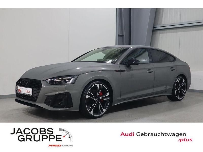 Chronosgrau metallic Gebraucht 2024 Audi A5 Sportback Business Kleinwagen | 52.470 € - Bild 1/4