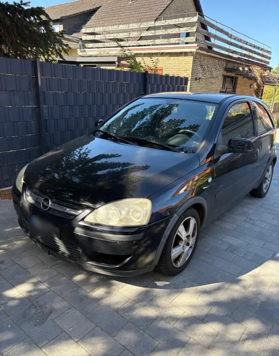 Second-hand Opel Corsa 75 CP (55 kW) 2004 Negru Hatchback
