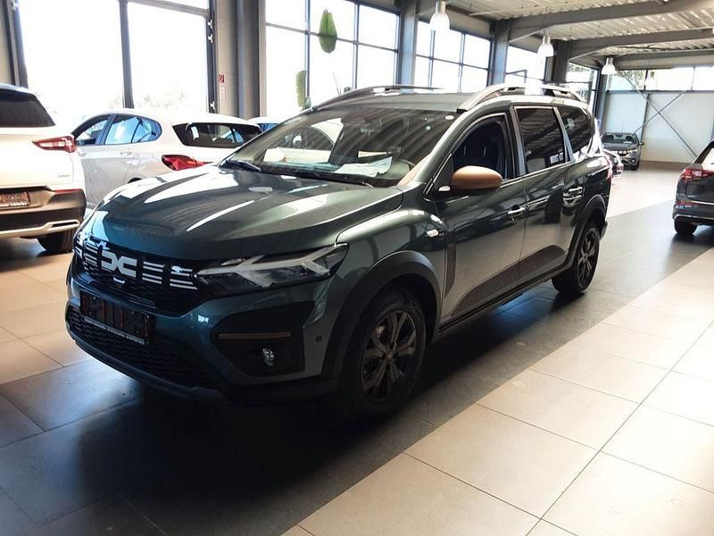 Grün Gebraucht 2024 Dacia Jogger Extreme Limousine | 19.990 € (Fairer Preis) - Bild 1/4