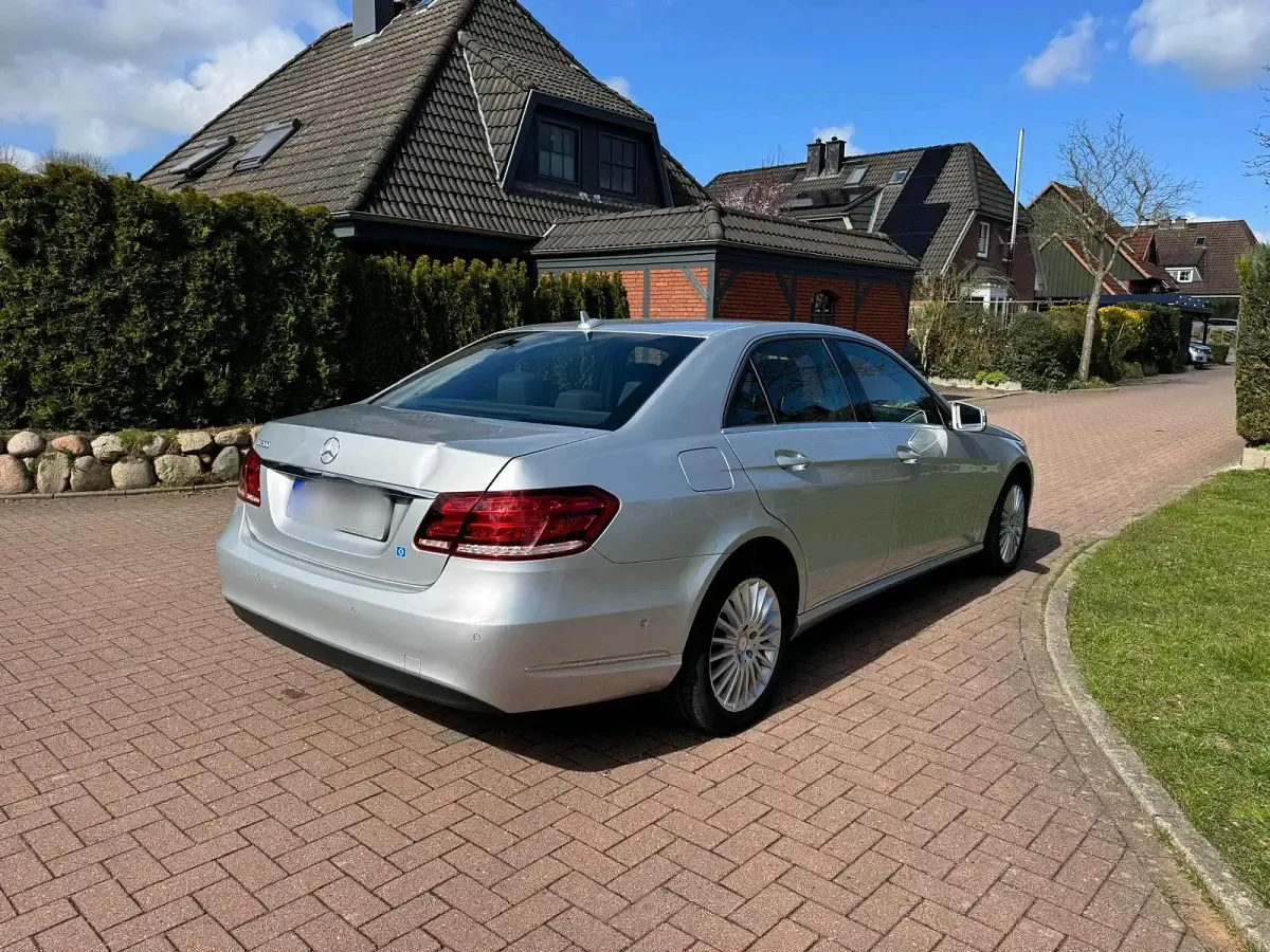 Second-hand Mercedes E200 184 CP (135 kW) 2014 Argintiu Berlinǎ