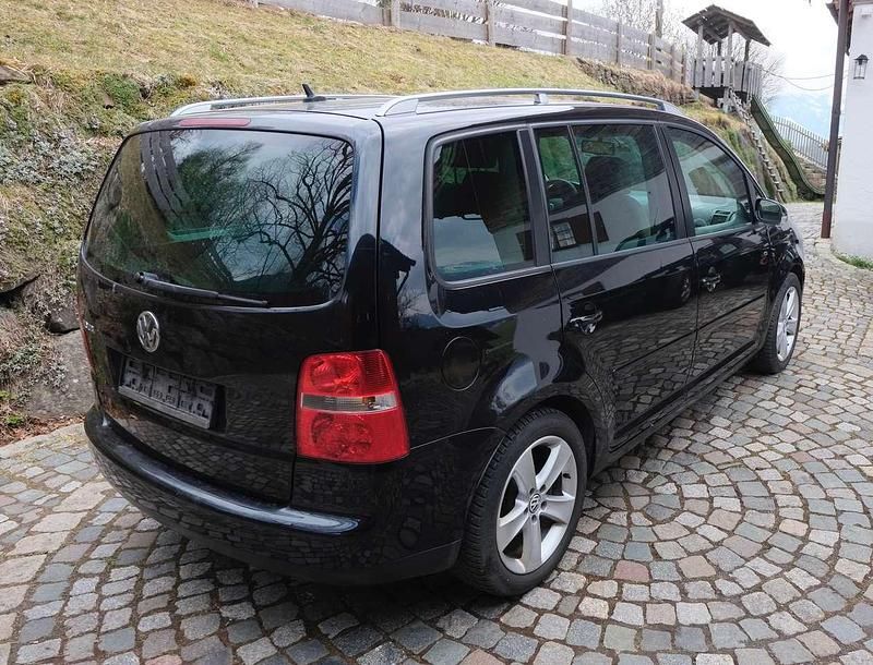 Gebraucht VW Touran Highline 170 PS (125 kW) 2011 Schwarz Van / Kleinbus