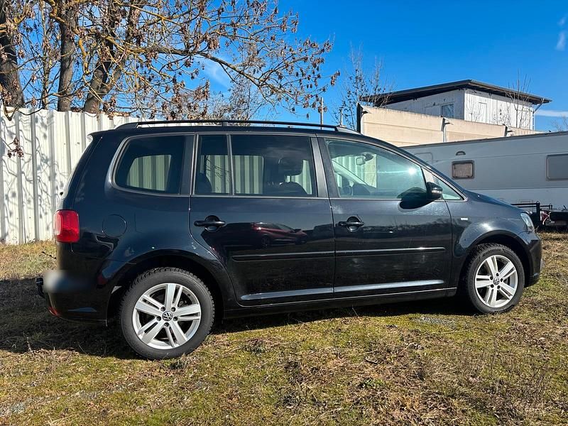 Gebraucht VW Touran 105 PS (77 kW) 2012 Schwarz Van / Kleinbus