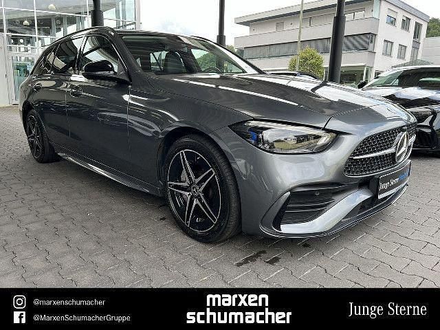 Gebraucht Mercedes C300e Business 313 PS (230 kW) 2023 Lack selenitgrau Kombi