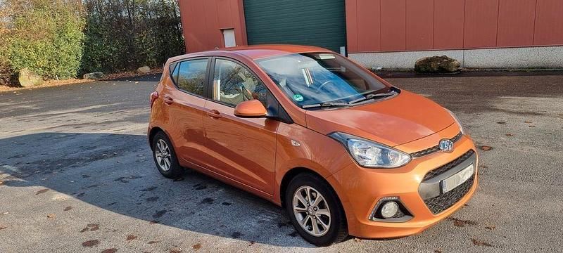 Orange Gebraucht 2014 Hyundai i10 Intro Edition Kleinwagen | 5.990 € (Fairer Preis) - Bild 1/4