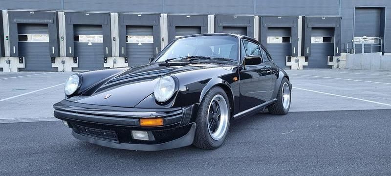 Schwarz Gebraucht 1985 Porsche 911 Carrera Coupé | 79.900 € - Bild 1/4