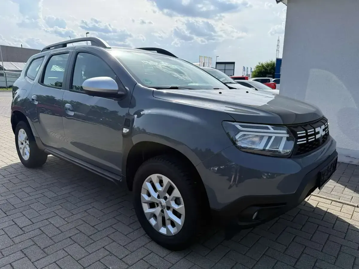 Gebraucht Dacia Duster Expression 116 PS (85 kW) 2023 Städtisches grau SUV