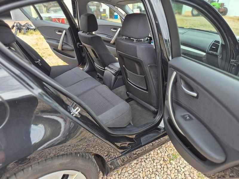 Second-hand BMW 116 122 CP (89 kW) 2009 Negru Hatchback