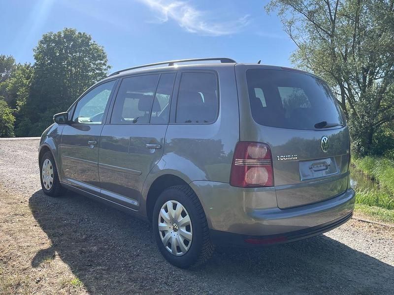Gebraucht VW Touran 105 PS (77 kW) 2010 Slate grey metallic Van / Kleinbus