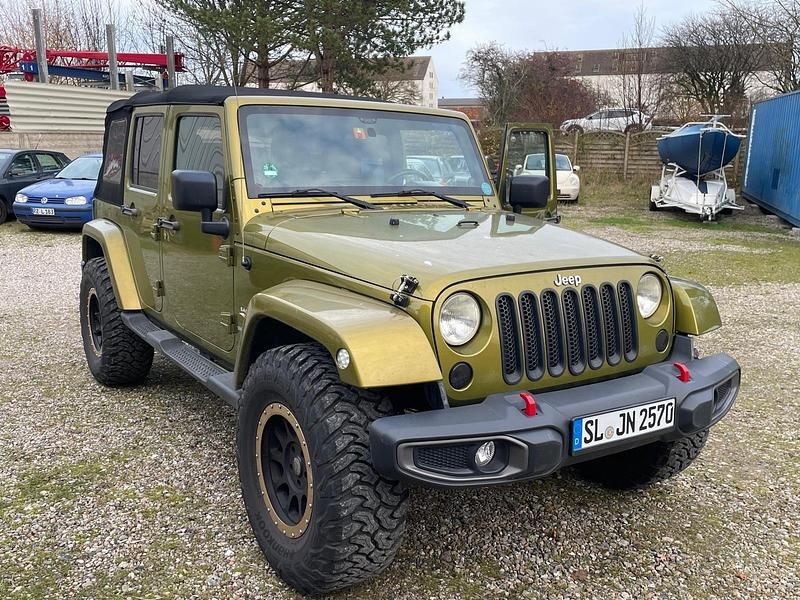 Grün Gebraucht 2012 Jeep Wrangler Sahara SUV | 25.000 € - Bild 1/4