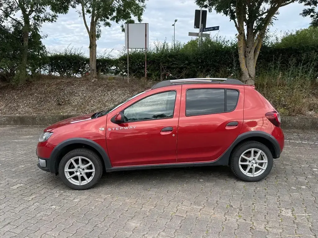 Gebraucht Dacia Sandero Stepway Ambiance 90 PS (66 kW) 2014 Rot Limousine