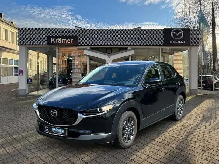 Magmarot (metallic) Gebraucht 2021 Mazda CX-30 Selection SUV | 24.950 € (Fairer Preis) - Bild 1/3