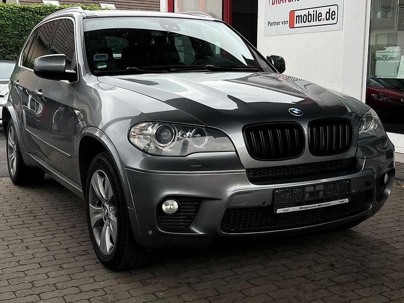 Grau Gebraucht 2012 BMW X5 M Sport SUV | 13.499 € (Superpreis) - Bild 1/4