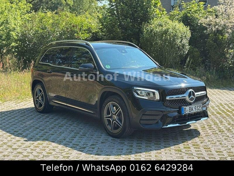 Schwarz Gebraucht 2021 Mercedes GLB220 AMG line SUV | 25.990 € (Fairer Preis) - Bild 1/4