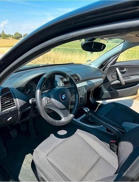 Gebraucht BMW 116 122 PS (89 kW) 2009 Schwarz Kleinwagen