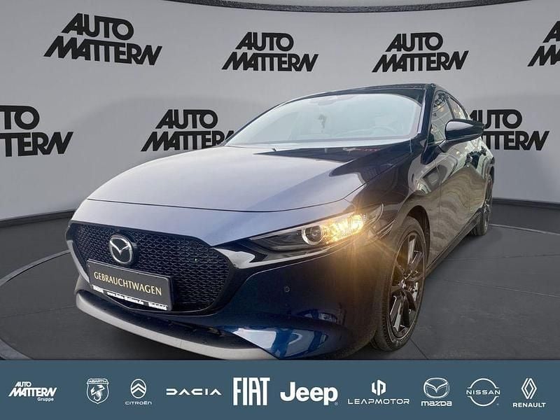 Deep crystal blue (metallic) Gebraucht 2023 Mazda 3 Homura-Line Limousine | 22.990 € (Fairer Preis) - Bild 1/4