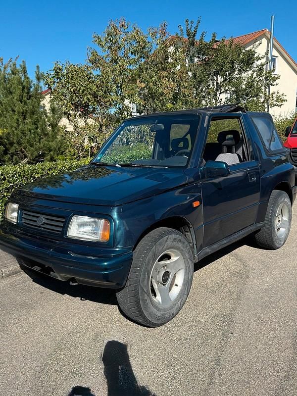 Grün Gebraucht 1995 Suzuki Vitara SUV | 6.800 € - Bild 1/4