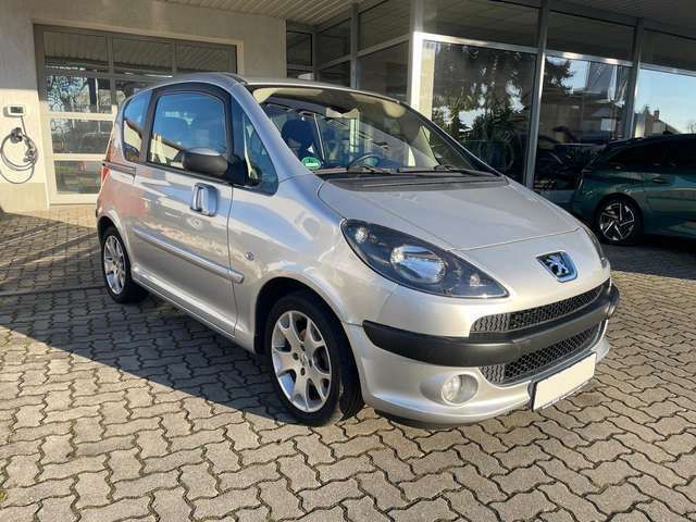 Aluminiumgrau/metallic Gebraucht 2008 Peugeot 1007 Premium Kleinwagen | 3.900 € (Fairer Preis) - Bild 1/4