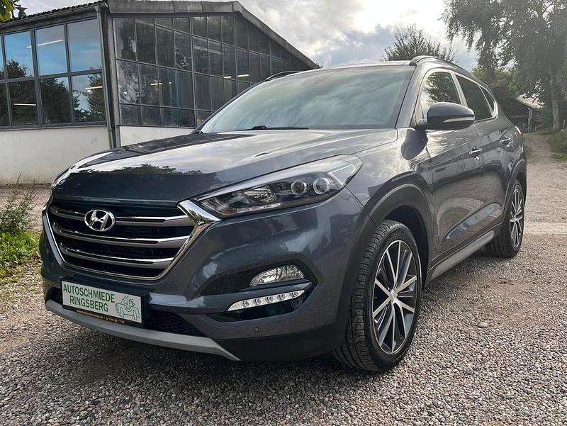 Grau Gebraucht 2018 Hyundai Tucson Passion Plus SUV | 17.499 € (Fairer Preis) - Bild 1/4