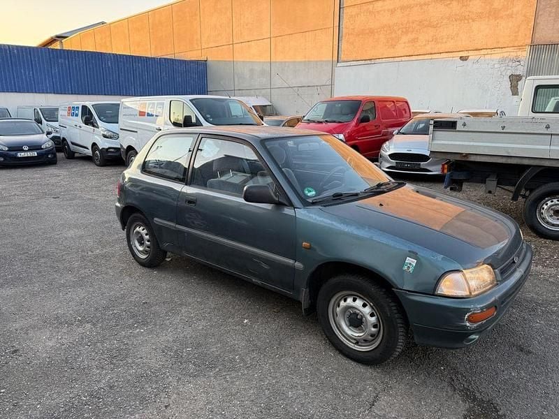 Grau Gebraucht 1993 Daihatsu Charade Kleinwagen | 650 € - Bild 1/4