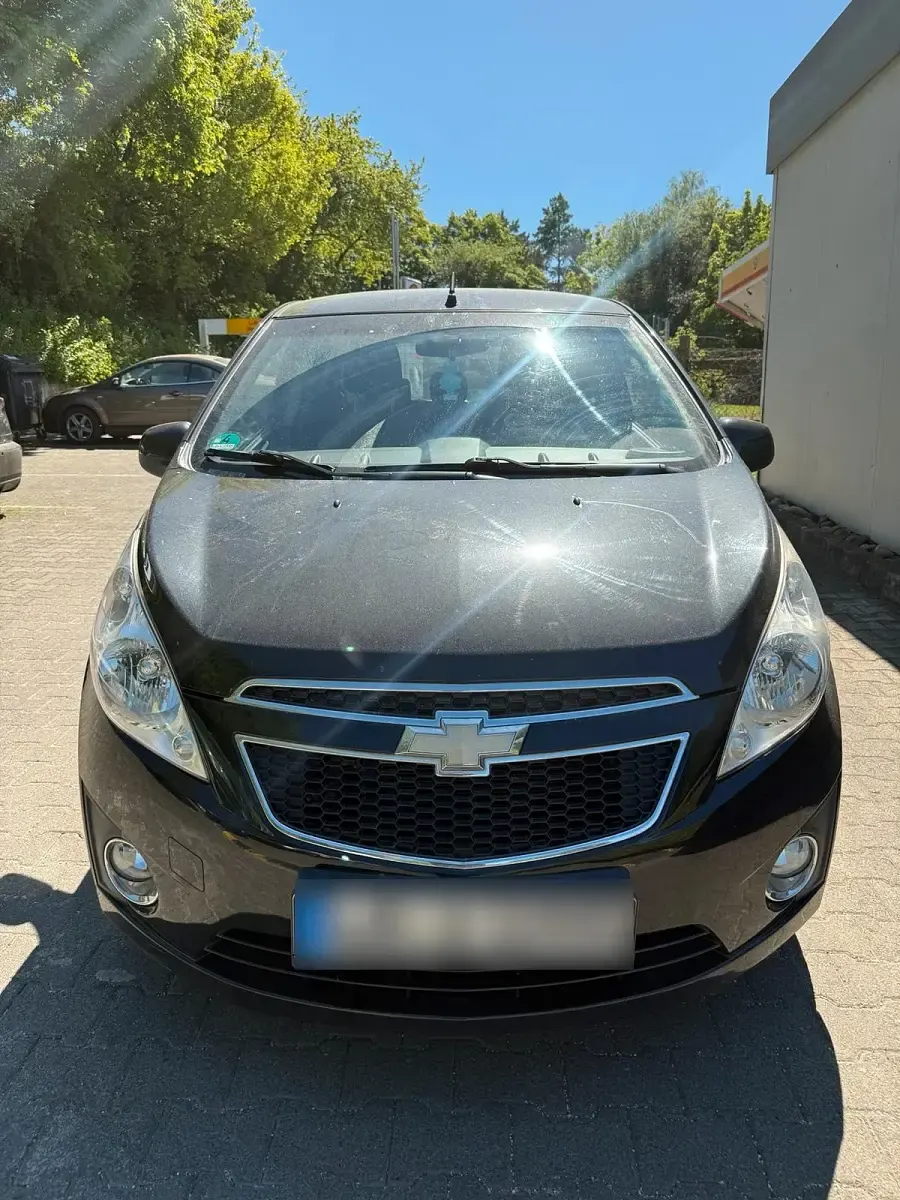 Second-hand Chevrolet Spark 68 CP (50 kW) 2012 Negru Hatchback