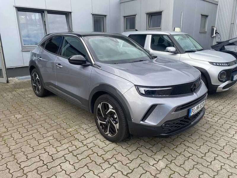Grau (kontrast grau) Gebraucht 2024 Opel Mokka-e Ultimate SUV | 37.990 € - Bild 1/4