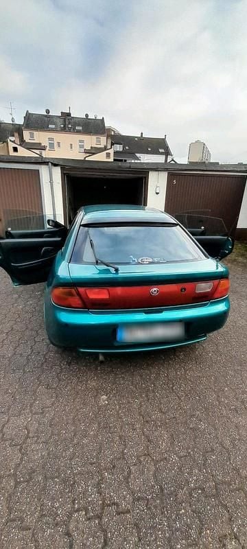 Gebraucht Mazda 323 88 PS (64 kW) 1995 Grün Limousine