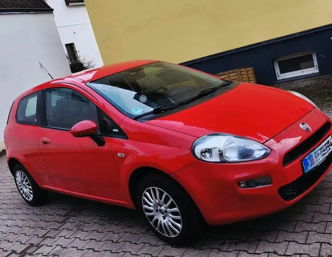 Gebraucht Fiat Grande Punto 60 PS (44 kW) 2013 Rot Kleinwagen