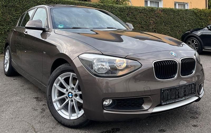 Braun Gebraucht 2014 BMW 116 Sport Line Kleinwagen | 7.740 € (Fairer Preis) - Bild 1/4