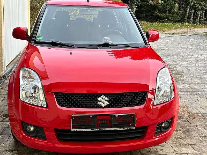 Rot Gebraucht 2009 Suzuki Swift Comfort Limousine | 4.200 € (Fairer Preis) - Bild 1/4