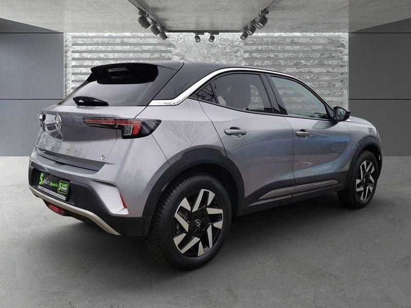 Gebraucht Opel Mokka-e Elegance 100 kW (136 PS) 2022 Kontrast grau/quarz silber SUV
