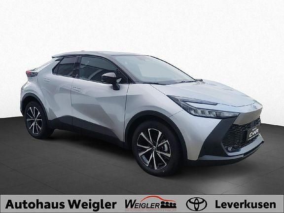 Gebraucht Toyota C-HR Team 197 PS (144 kW) 2024 Shimmering silver metallic / dach schwarz SUV