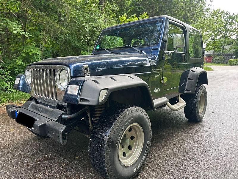 Blau Gebraucht 2002 Jeep Wrangler Sport SUV | 9.999 € - Bild 1/4