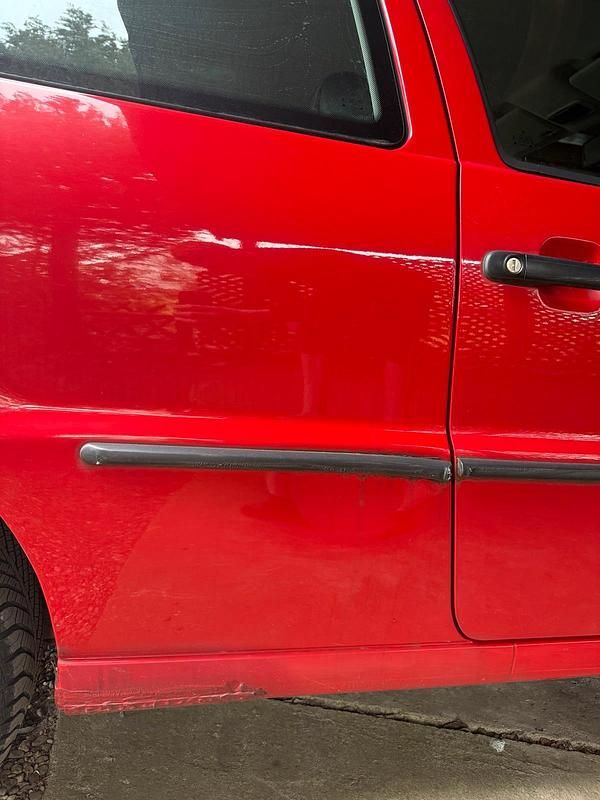 Używany VW Polo 60 KM (44 kW) 1997 Czerwony Hatchback