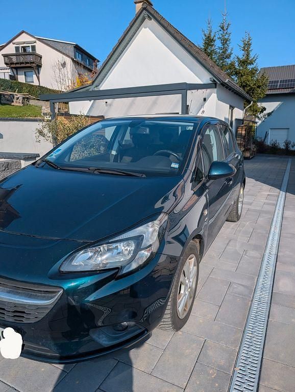 Gebraucht Opel Corsa drive 90 PS (66 kW) 2016 Grün Kleinwagen