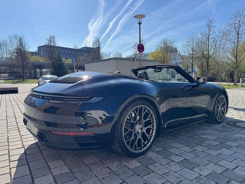 Gebraucht Porsche 992 385 PS (283 kW) 2024 Schwarz Cabrio