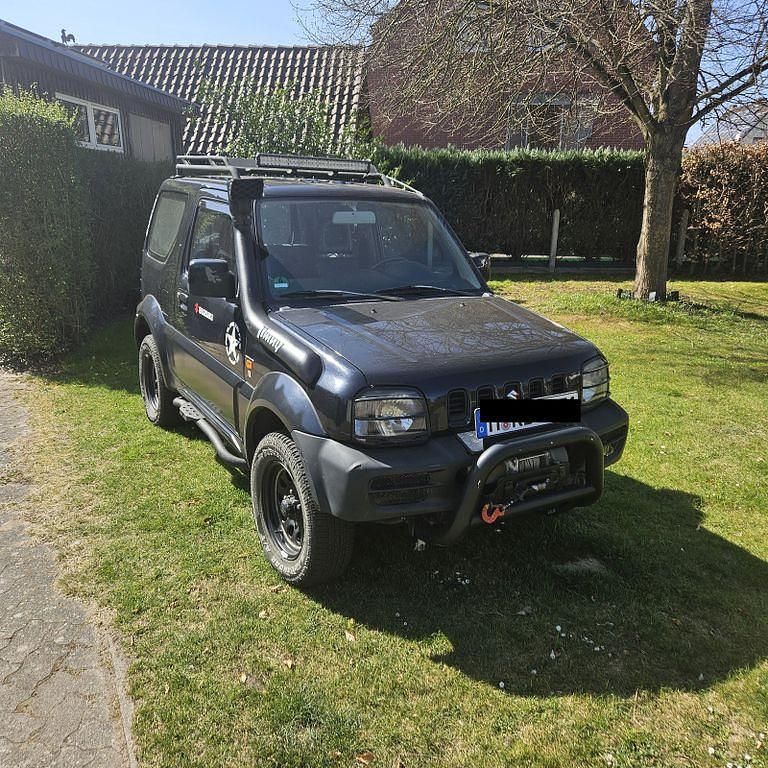 Schwarz Gebraucht 2010 Suzuki Jimny Comfort SUV | 10.500 € (Etwas zu teuer) - Bild 1/4