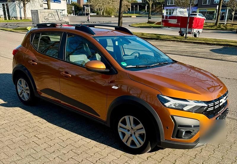 Gebraucht Dacia Sandero Expression 91 PS (66 kW) 2023 Orange Limousine