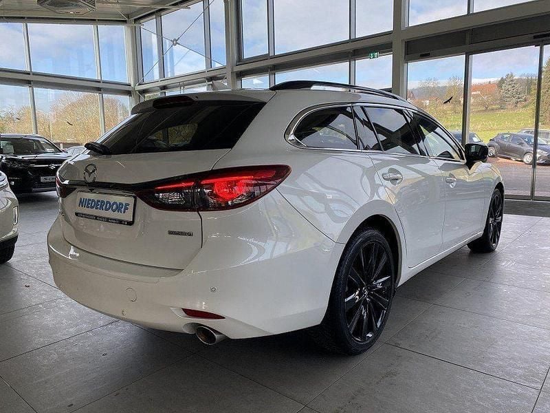 Gebraucht Mazda 6 Homura-Line 194 PS (142 kW) 2024 Rhodium white (metallic) Kombi