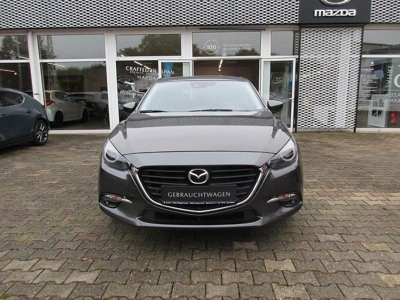 Grau Gebraucht 2018 Mazda 3 Exclusive-Line Limousine | 10.890 € (Guter Preis) - Bild 1/4