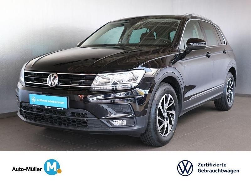 Deep black perleffekt (metallic) Gebraucht 2018 VW Tiguan Comfortline SUV | 22.980 € (Fairer Preis) - Bild 1/4