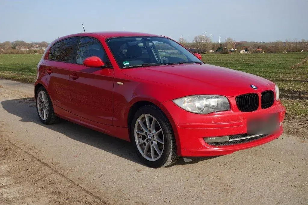 Używany BMW 116 122 KM (89 kW) 2009 Czerwony Hatchback