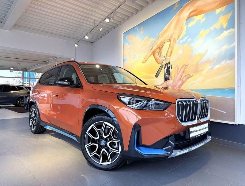 Gebraucht BMW iX1 xLine 230 kW (313 PS) 2023 Utah orange metallic SUV